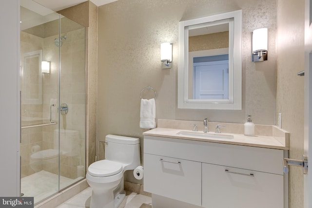 50 S 16th St Unit 5401, Philadelphia, PA 19102 - bathroom featuring toilet, a stall shower, and vanity