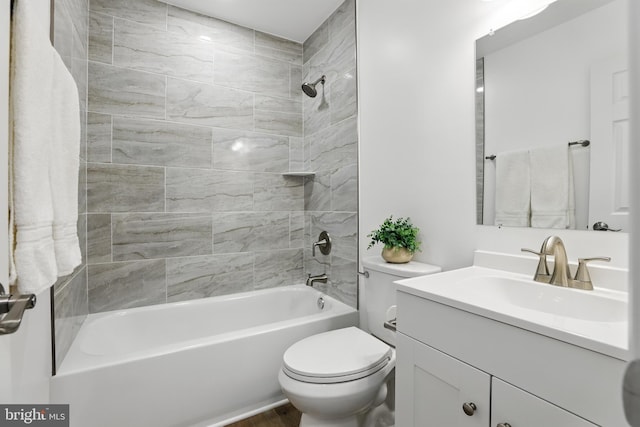 9928 Brookridge Ct, Gaithersburg, MD 20886 - bathroom with vanity, toilet, shower / washtub combination, and wood finished floors