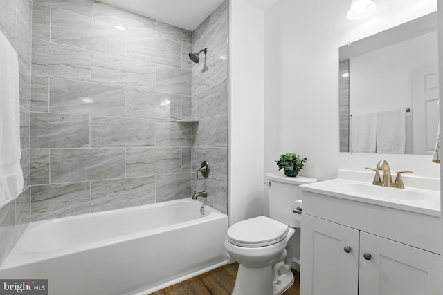 9928 Brookridge Ct, Gaithersburg, MD 20886 - bathroom featuring vanity, bathtub / shower combination, wood finished floors, and toilet