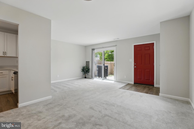 9928 Brookridge Ct, Gaithersburg, MD 20886 - unfurnished living room with carpet floors and baseboards