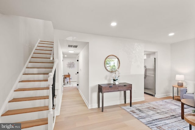 2532 Sedgewick Pl, Dumfries, VA 22026 - stairway with wood finished floors, baseboards, and recessed lighting