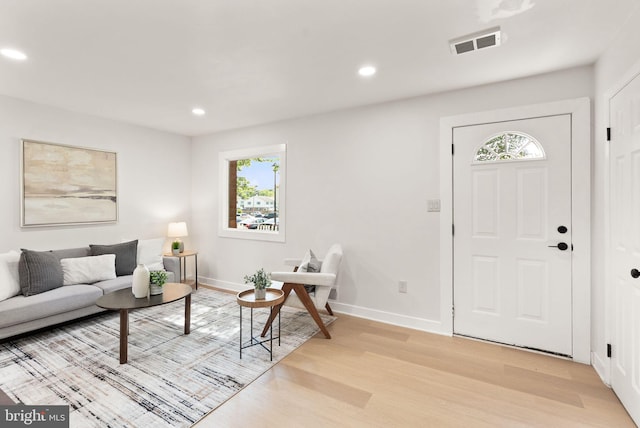 2532 Sedgewick Pl, Dumfries, VA 22026 - living room featuring light wood-type flooring, recessed lighting, and baseboards