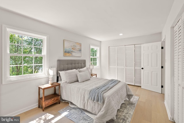 2532 Sedgewick Pl, Dumfries, VA 22026 - bedroom with baseboards, light wood-style flooring, recessed lighting, and a closet