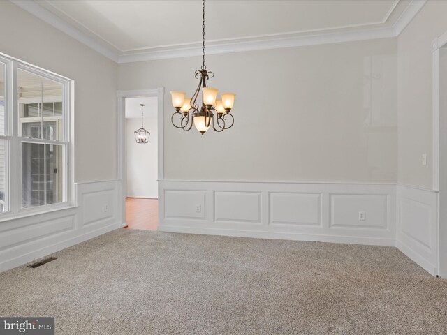 17494 Lethridge Cir, Round Hill, VA 20141 - carpeted empty room with crown molding, a chandelier, wainscoting, and a decorative wall