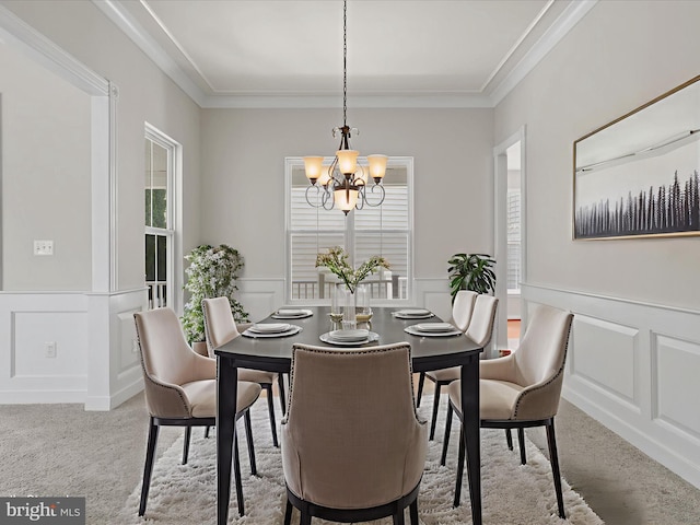 17494 Lethridge Cir, Round Hill, VA 20141 - carpeted dining space with a decorative wall, a chandelier, a wainscoted wall, and crown molding
