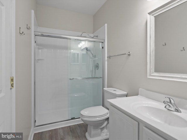 17494 Lethridge Cir, Round Hill, VA 20141 - bathroom with a shower stall, vanity, and wood finished floors