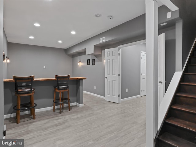 17494 Lethridge Cir, Round Hill, VA 20141 - indoor dry bar featuring stairs, recessed lighting, and light wood-style floors