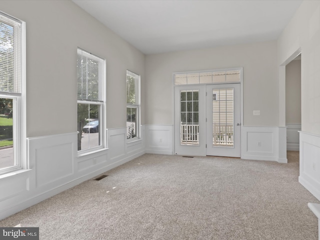 17494 Lethridge Cir, Round Hill, VA 20141 - carpeted empty room featuring wainscoting and a decorative wall