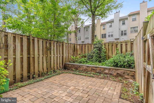 103 Barnsfield Ct Unit 227, Gaithersburg, MD 20878 - fenced backyard with a patio and a residential view