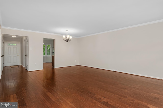 103 Barnsfield Ct Unit 227, Gaithersburg, MD 20878 - unfurnished room with a chandelier, dark wood-style flooring, baseboards, and ornamental molding