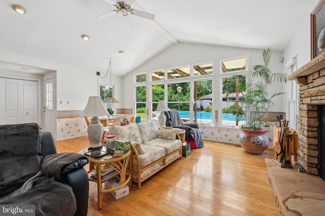 2 Tomahawk Dr, Marlton, NJ 08053 - living room featuring light wood-type flooring, plenty of natural light, a ceiling fan, and lofted ceiling
