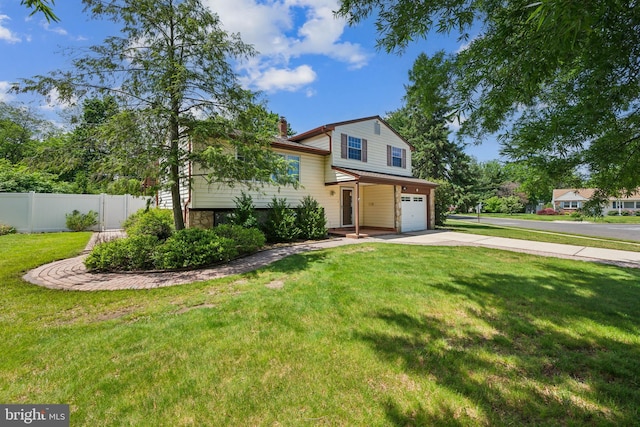2 Tomahawk Dr, Marlton, NJ 08053 - tri-level home with a garage, concrete driveway, and a chimney