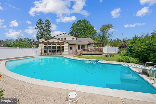 2 Tomahawk Dr, Marlton, NJ 08053 - view of swimming pool featuring a wooden deck, a fenced backyard, a pergola, and a gate