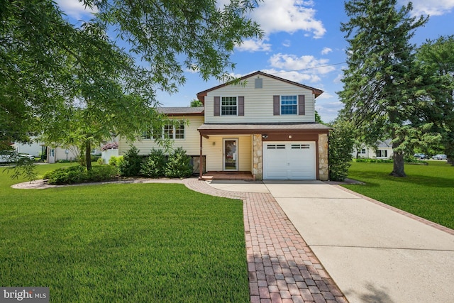 2 Tomahawk Dr, Marlton, NJ 08053 - tri-level home featuring stone siding, a garage, driveway, and a front yard