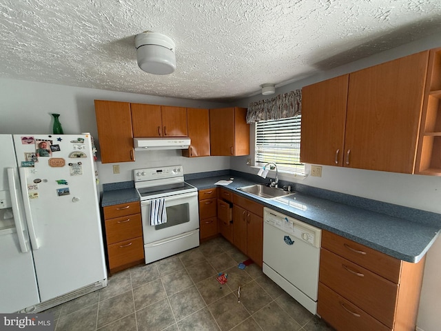 11565 Timberbrook Dr, Waldorf, MD 20601 - kitchen featuring white appliances, under cabinet range hood, brown cabinets, dark countertops, and a textured ceiling