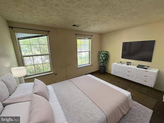 11565 Timberbrook Dr, Waldorf, MD 20601 - carpeted bedroom featuring a textured ceiling