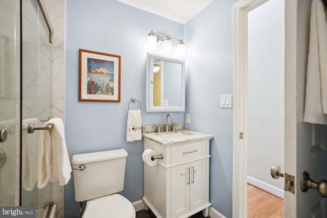 1725 Willard St NW Unit 3, Washington, DC 20009 - bathroom with vanity, wood finished floors, and an enclosed shower