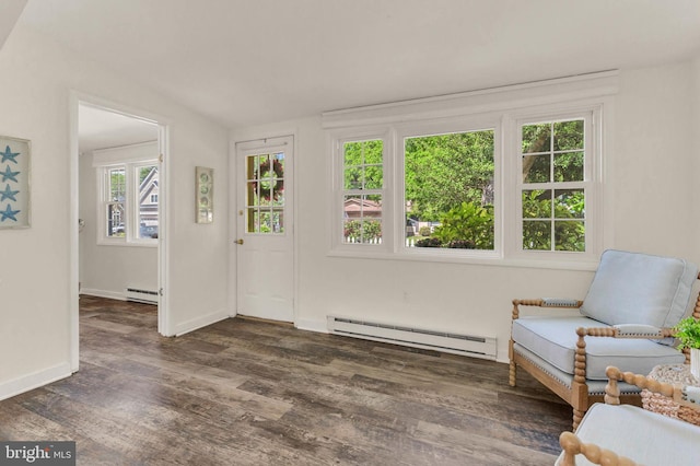 735 Shore Dr, Edgewater, MD 21037 - sitting room featuring a baseboard radiator, dark wood-style flooring, vaulted ceiling, and baseboards