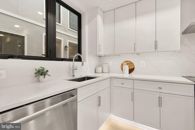 503 L St NE Unit B, Washington, DC 20002 - kitchen featuring dishwasher, a sink, white cabinets, and light countertops