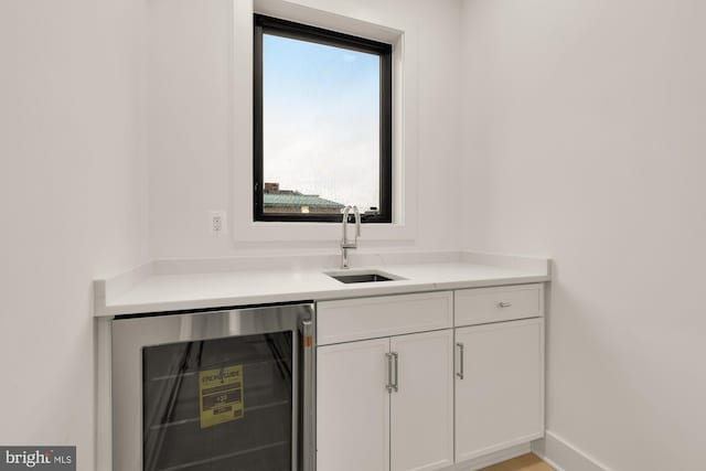 503 L St NE Unit B, Washington, DC 20002 - bar with wine cooler, a sink, and baseboards