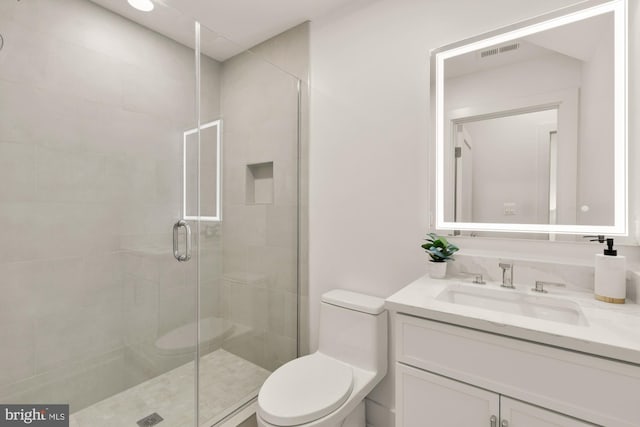 503 L St NE Unit B, Washington, DC 20002 - bathroom with toilet, vanity, and a stall shower