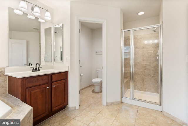 42030 Zircon Dr, Aldie, VA 20105 - bathroom with a shower stall, vanity, toilet, tile patterned floors, and baseboards