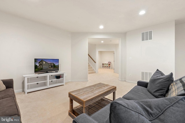 42030 Zircon Dr, Aldie, VA 20105 - living room featuring light colored carpet, stairs, recessed lighting, and baseboards