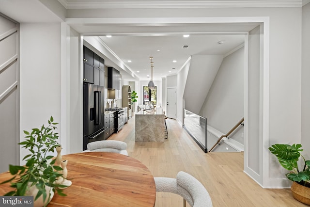 1407 1st St NW Unit 1, Washington, DC 20001 - dining area featuring light wood-style floors, recessed lighting, crown molding, and baseboards