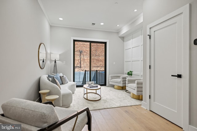 1407 1st St NW Unit 1, Washington, DC 20001 - living room with ornamental molding, light wood finished floors, and recessed lighting