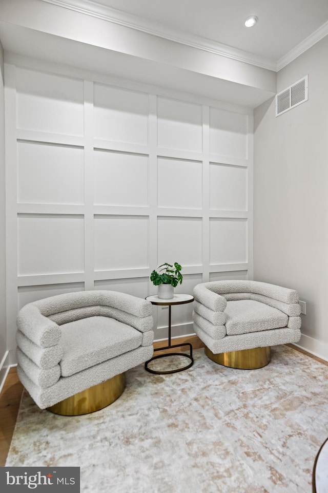 1407 1st St NW Unit 1, Washington, DC 20001 - sitting room featuring crown molding, baseboards, recessed lighting, wood finished floors, and a decorative wall