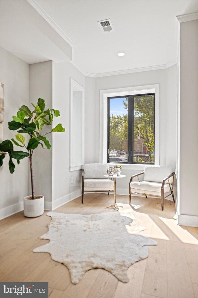 1407 1st St NW Unit 1, Washington, DC 20001 - sitting room with baseboards, wood finished floors, and ornamental molding