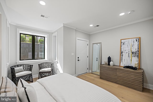 1407 1st St NW Unit 1, Washington, DC 20001 - bedroom with light wood-style flooring, recessed lighting, baseboards, and ornamental molding