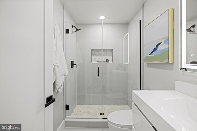 1407 1st St NW Unit 1, Washington, DC 20001 - bathroom with a shower stall, toilet, vanity, and recessed lighting