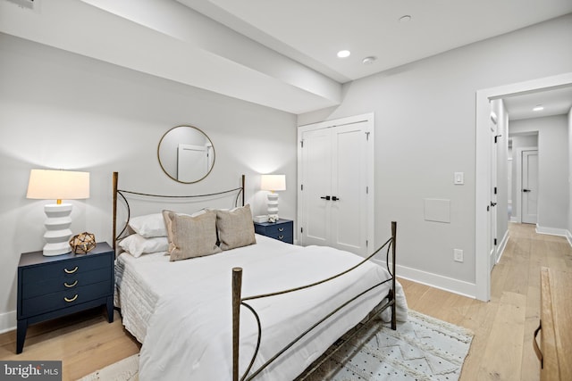 1407 1st St NW Unit 1, Washington, DC 20001 - bedroom featuring light wood-style flooring, a closet, baseboards, and recessed lighting