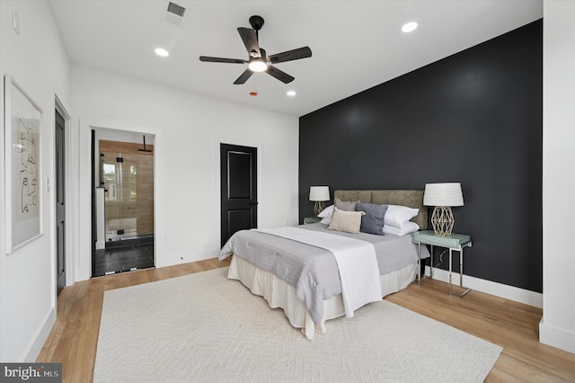 642 S 51st St, Philadelphia, PA 19143 - bedroom featuring wood finished floors, baseboards, recessed lighting, ensuite bathroom, and ceiling fan
