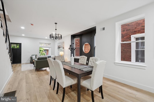642 S 51st St, Philadelphia, PA 19143 - dining room with light wood-type flooring, baseboards, a chandelier, recessed lighting, and stairs