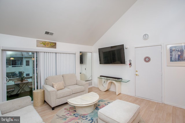 48 Bonnie Gellman Ct Unit B48, Philadelphia, PA 19114 - living area with light wood finished floors, high vaulted ceiling, and baseboards