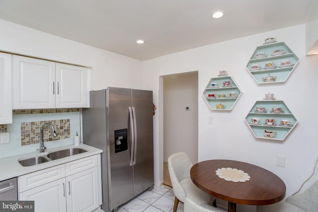 48 Bonnie Gellman Ct Unit B48, Philadelphia, PA 19114 - kitchen featuring appliances with stainless steel finishes, a sink, white cabinetry, light countertops, and recessed lighting