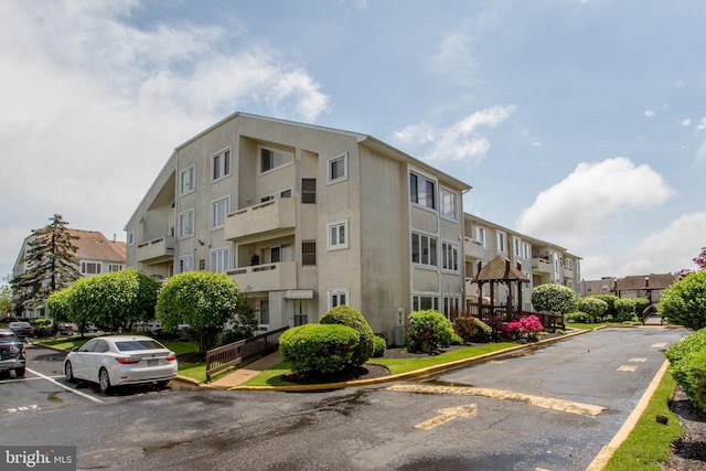 48 Bonnie Gellman Ct Unit B48, Philadelphia, PA 19114 - view of building exterior featuring uncovered parking and a residential view