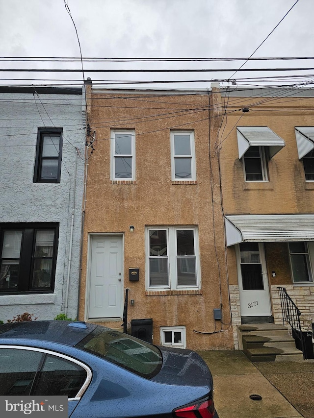 3173 Salmon St, Philadelphia, PA 19134 - townhome / multi-family property featuring stucco siding