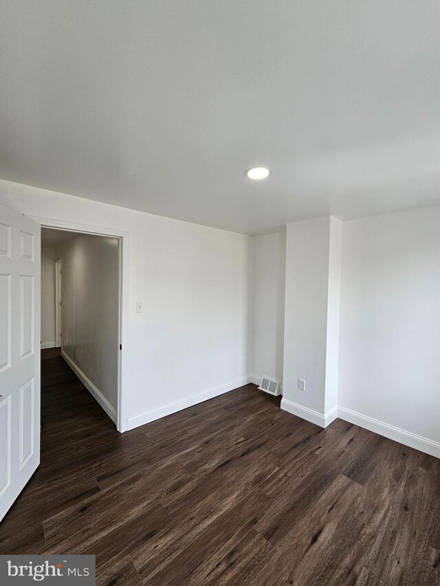 3173 Salmon St, Philadelphia, PA 19134 - unfurnished room featuring dark wood finished floors, recessed lighting, and baseboards