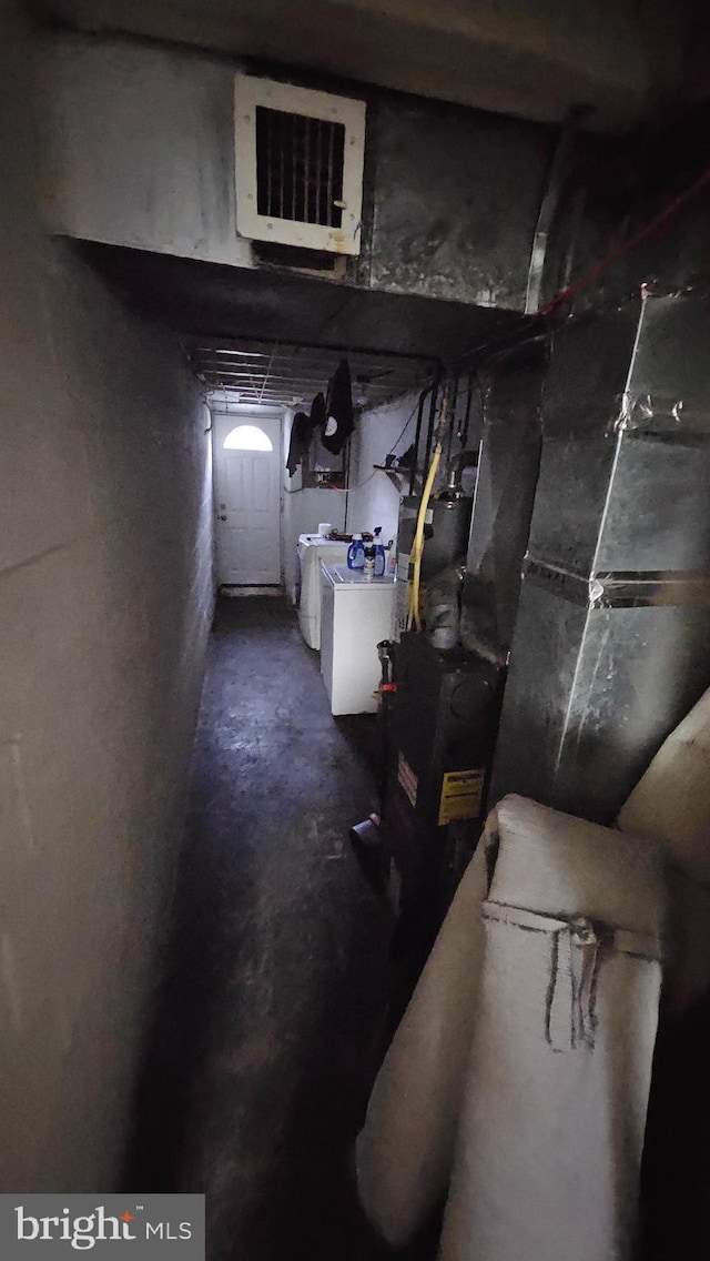 2209 Brighton St, Philadelphia, PA 19149 - unfinished below grade area featuring washer and dryer