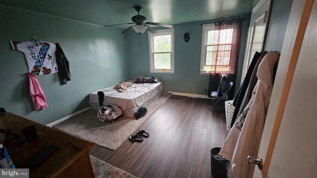 2209 Brighton St, Philadelphia, PA 19149 - bedroom with baseboards, wood finished floors, and a ceiling fan