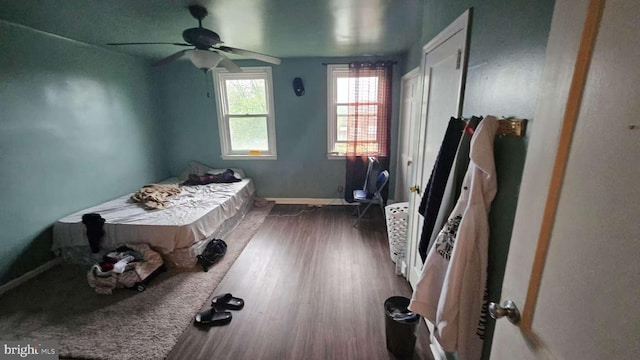 2209 Brighton St, Philadelphia, PA 19149 - bedroom with baseboards, wood finished floors, and a ceiling fan