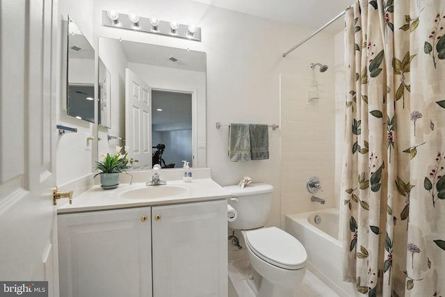 bathroom with shower / tub combo with curtain, toilet, and vanity