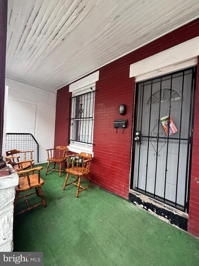 4333 N Orianna St, Philadelphia, PA 19140 - entrance to property featuring a porch and brick siding