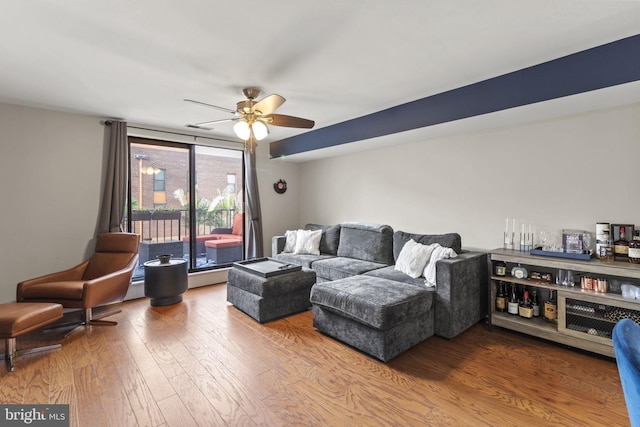 1918 Nectarine St, Philadelphia, PA 19130 - living room with wood finished floors, a ceiling fan, and a dry bar