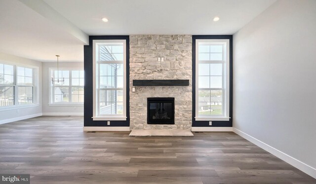 2030 N Fall Harvest Dr, Mechanicsburg, PA 17055 - unfurnished living room featuring healthy amount of natural light, baseboards, wood finished floors, and recessed lighting