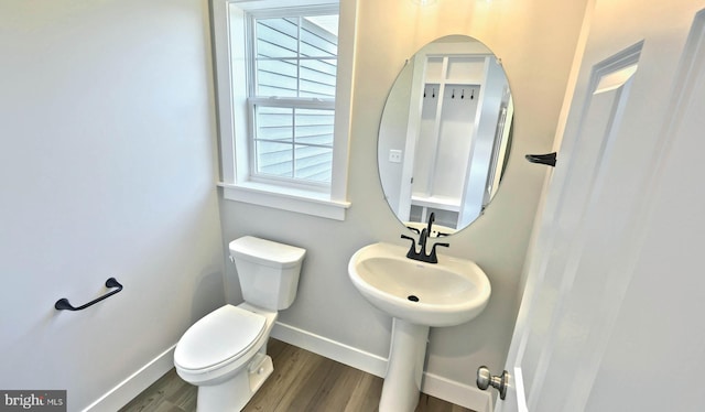 2030 N Fall Harvest Dr, Mechanicsburg, PA 17055 - bathroom with baseboards, wood finished floors, and toilet