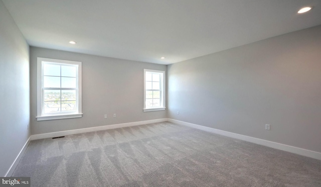 2030 N Fall Harvest Dr, Mechanicsburg, PA 17055 - empty room featuring light colored carpet, baseboards, and recessed lighting